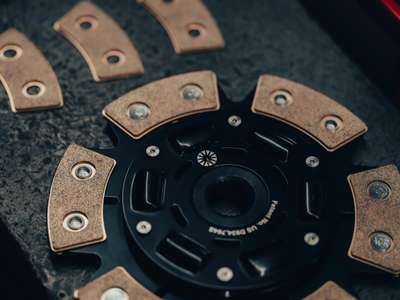 Action Clutch Clutch Kit ACR-3459 &ndash; Reinforced Non Self-Adjust Type Diaphragm Number of Teeth: 112 ring gear teeth Type: Single Disc Clutch Kits Interchange Part Number: 03-047 03-049 K70280-01 K70288-02 DMF019 195461, 21-20-7-531-843 21-21-7-526-588 21-21-7-512-474 Input Spline Quantity: 10 Manufacturer Warranty: 1 Year OE/OEM Part Number: 03-047 03-049 K70280-01 K70288-02 DMF019 195461, 21-20-7-531-843 21-21-7-526-588 21-21-7-512-474 Disc Material: Ceramic Input Shaft Diameter: 1-1/8 in (28.6 mm) UPC: Does not apply &ndash; Fits BMW 330Ci 01-03 3.0L DOHC (M54) 5 Speed thumbnail 5